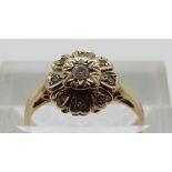 A 9ct gold ring set with diamonds, size J, 2.