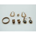 A 9ct gold ring and 9ct gold earrings including a pair in the form of dolphins and a pair set with