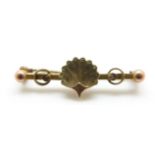 A 9ct gold Victorian brooch in the form of a shell,
