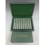 A cased set of silver '100 Greatest Cars' miniature ingots,