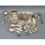 A collection of plated ware including a large twin handled tray with gadrooned edge,