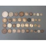 A collection of largely pre 1920 silver coinage including overseas, 19thC French, Austrian etc.