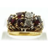 An 18ct gold ring set with diamonds and rubies, size N, 8.