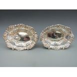 A pair of Victorian hallmarked silver pierced bon bon dishes,