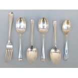 Four hallmarked silver Hanoverian rat tail pattern dessert spoons,