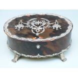 A hallmarked silver and tortoiseshell oval lidded dressing table pot London 1906 maker's mark