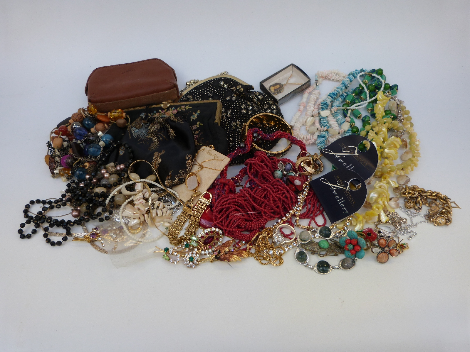 A collection of costume jewellery to include necklaces,