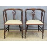 A pair of late 19thC bow backed inlaid armchairs