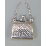 A small white metal purse or stamp case marked 925, length 32mm,