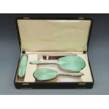 A Selfridge & Co Ltd George VI hallmarked silver and guilloché enamel dressing table set comprising