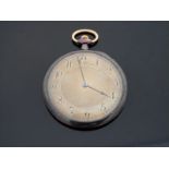A yellow metal cased slim Art Deco style continental pocket watch with keyless wind movement and