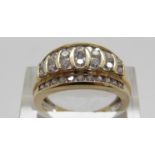 A 14ct gold ring set with round cut diamonds, size N, 5.