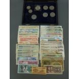 Over thirty used world bank notes includes some English bank notes, still crisp,