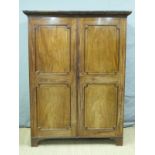 A 19thC panelled mahogany wardrobe opening to reveal hanging space and single drawer,