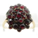 A 9ct gold ring set with Bohemian garnets, size Q, 4.