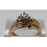 A 10k gold ring set with diamonds, size N, 3.