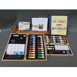 A quantity of artist's materials including acrylic and watercolour paints,