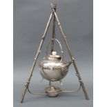 A plated spirit kettle with unusual three-branch tripod stand