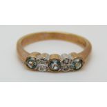 A 9ct gold ring set with blue topaz and diamonds, size M, 2.