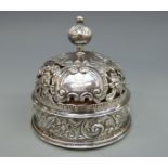 A Victorian hallmarked silver table or desk bell with turn to ring action and marked patent 4901,