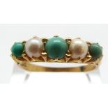 An 18ct gold ring set with alternating pearls and turquoise, size W, 5.