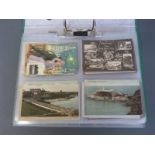 A file of approximately 160 Edwardian postcards topographical, humorous,