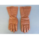 A pair of leather flying gauntlets marked 22C / 1026 and type H.