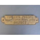 A brass or similar plaque bearing name Fowler's Patent Steam Plough Works Leeds No.