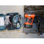 A Black & Decker sander and cordless drill