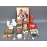 A collection of medical advertising items including inhalers, unopened Elastoplast tins, eye baths,