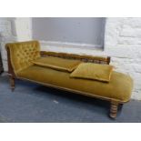 A 19thC upholstered chaise longue with turned supports to rear and turned legs