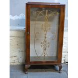 A retro glazed display cabinet,