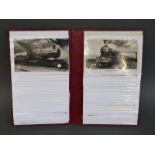 A postcard album containing approximately 80 steam railway locomotive postcards including Southern,