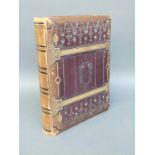 A Victorian leather-bound Carte Visite album containing mainly studio portraits but some buildings