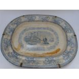 A 19thC blue and white meat plate with central scene of a sailing boat and abbey ruins