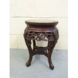 A Chinese carved hardwood side table with red marble top, 46 x 30.