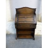 An oak Art Nouveau style student's bureau,