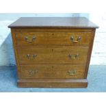 A late 19thC/early 20thC oak chest of three drawers,