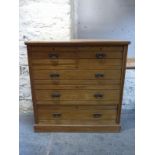 A 19thC ash chest of two over three graduated drawers,