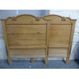 A pair of pine single sleigh type beds