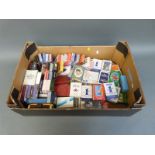 A collection of approximately 70 packs of playing cards to include Grants Whiskey,