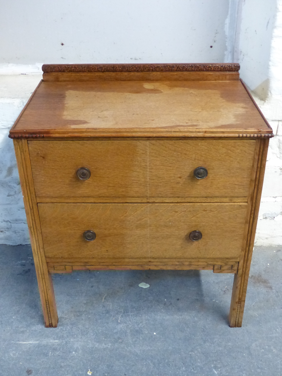 An oak chest of two drawers,