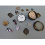 A Smiths pocket watch in a brass miner's type case, Cheltenham Steeplechase badges,