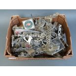 A large quantity of mainly 1930's, 70's and 80's car badges including Caravan Club, Alfa Romeo,