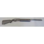 Remington model 1100 12 bore semi-automatic shotgun with semi-pistol grip, engraved lock,