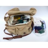 A bag of fisherman's and other sporting equipment including a brass trout fishing reel marked Ogden
