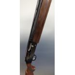 Mossberg model 9200 semi-automatic shotgun with chequered grip and forend, engraved lock,