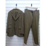 A tweed shooting suit by Kilmaine, with label for The Famous,