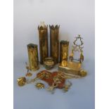 A collection of brass items including trench art shell cases