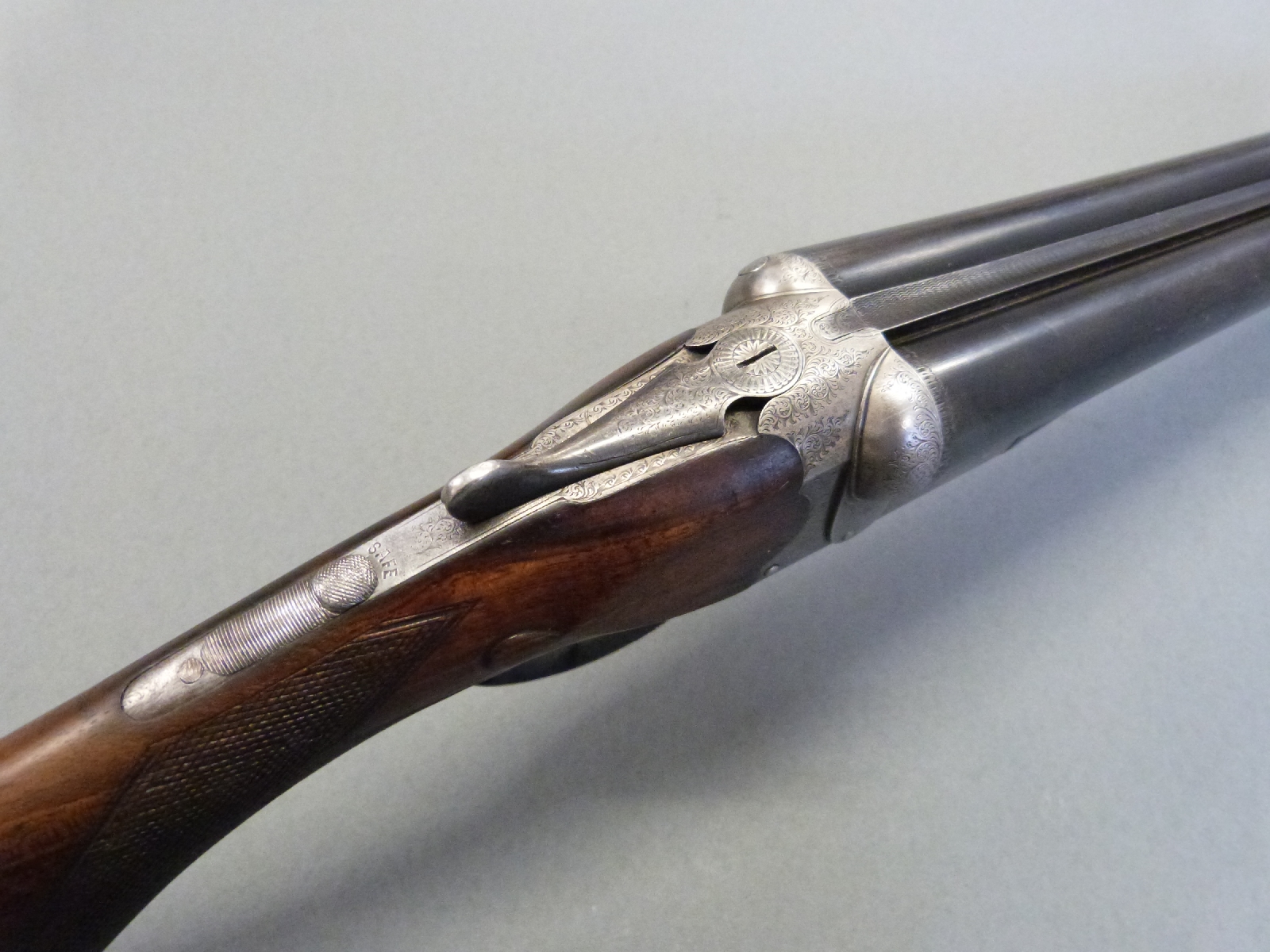 Lincoln Jeffries 12 bore side by side shotgun with ornate engraving to the shaped locks, top plate, - Image 8 of 13